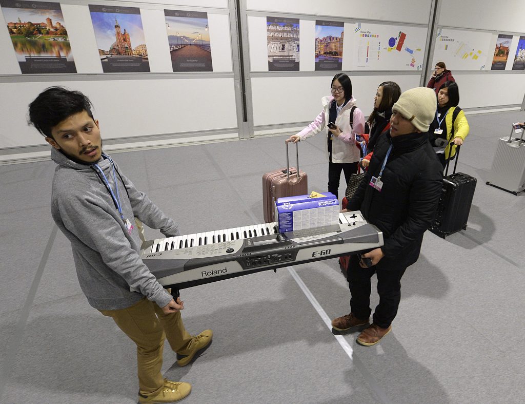 Poland Climate Participants leave before the end of the final session of the COP24 summit on climate change in Katowice, Poland on Friday, Dec. 14. (Czarek Sokolowski/AP)