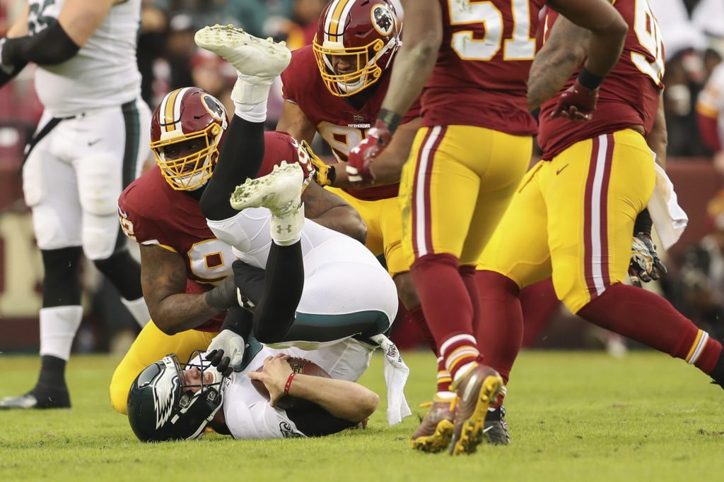 Stacy McGee, Nick Foles Washington Redskins defensive tackle Stacy McGee (92) sacks Philadelphia Eagles quarterback Nick Foles (9) during the first half of the NFL football game, Sunday, Dec. 30, 2018 in Landover, Md. (Andrew Harnik/AP)