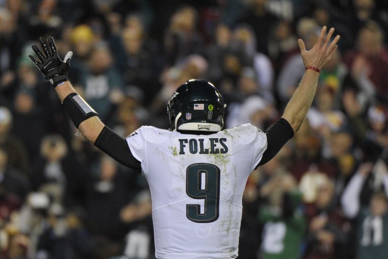 Philadelphia Eagles quarterback Nick Foles (9) reacts to wide receiver Nelson Agholor's touchdown during the second half of the NFL football game against the Washington Redskins, Sunday, Dec. 30, 2018 in Landover, Md. (Mark Tenally/AP Photo)