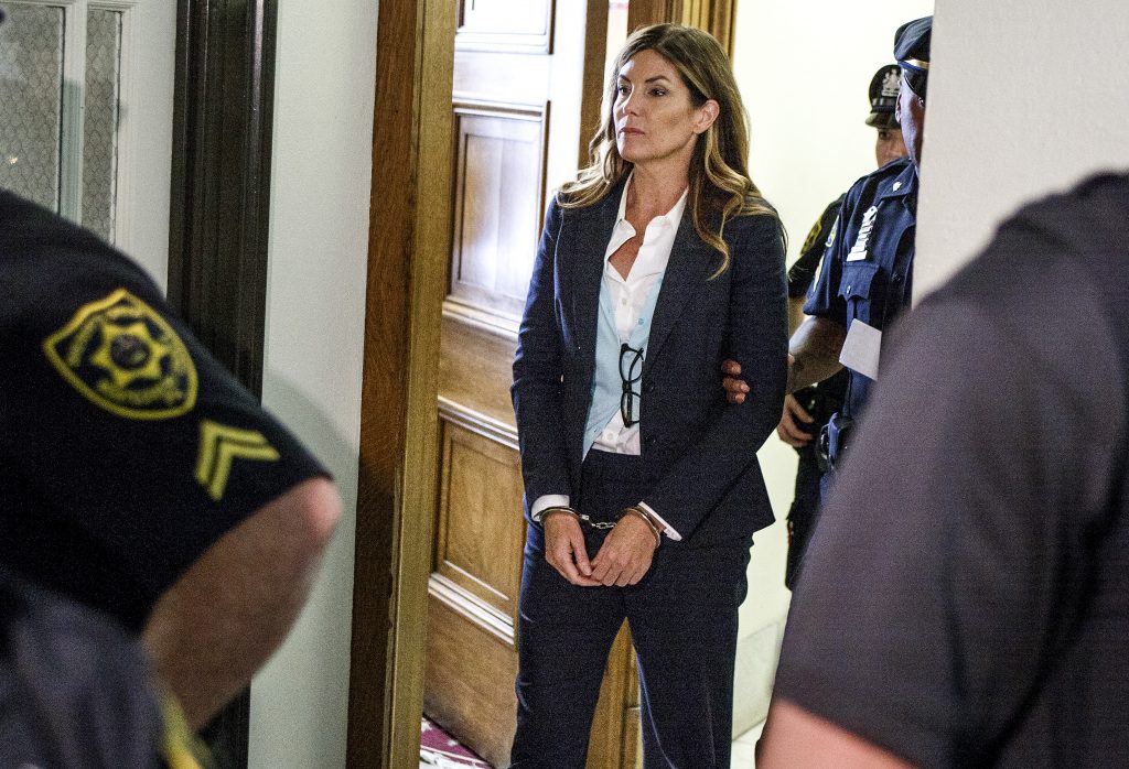 Kathleen Kane Former Pennsylvania Attorney General Kathleen Kane leaves court in handcuffs after her sentencing at the Montgomery County Courthouse in Norristown, Pa., Monday, Oct. 24, 2016. Kane was sentenced to 10-to-23 months in county jail and 8 years probation. In August 2016, Kane was found guilty of felony perjury and an assortment of misdemeanors related to a leak of secret grand jury materials. (Dan Gleiter/PennLive.com via AP, Pool)