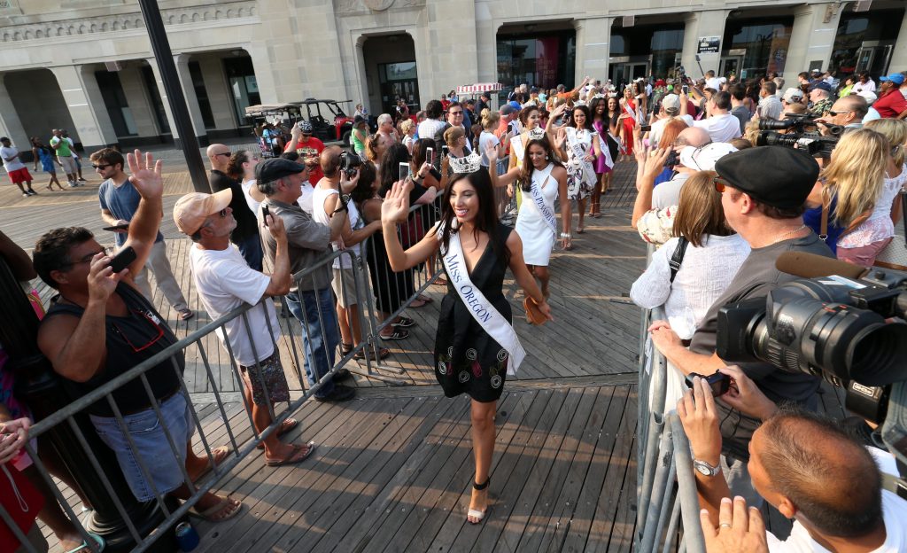 Miss America Contestants Miss America contestants wave during the traditional Miss America welcoming ceremony on the Atlantic City, N.J., Boardwalk on Tuesday, Sept. 1, 2015. (Edward Lea/The Press of Atlantic City via AP)