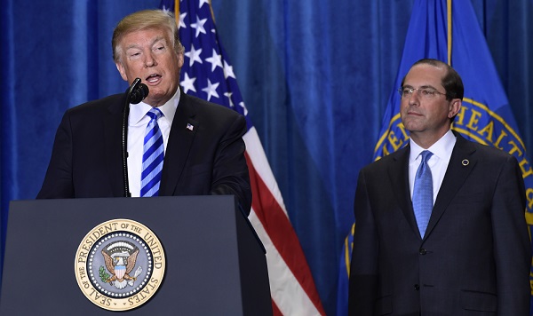 Donald Trump, Alex Azar President Donald Trump, stands with Health and Human Services Secretary Alex Azar, and talks about drug prices during a visit to the Department of Health and Human Services in Washington, Thursday, Oct. 25, 2018. (Susan Walsh/AP Photo)