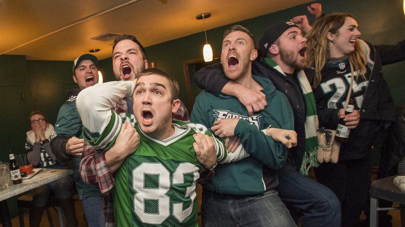 The mood grows tense during the final two and a half minutes of the Super Bowl on Feb. 4, 2018, in which the Philadelphia Eagles defeated the New England Patriots. (Jonathan Wilson for WHYY)