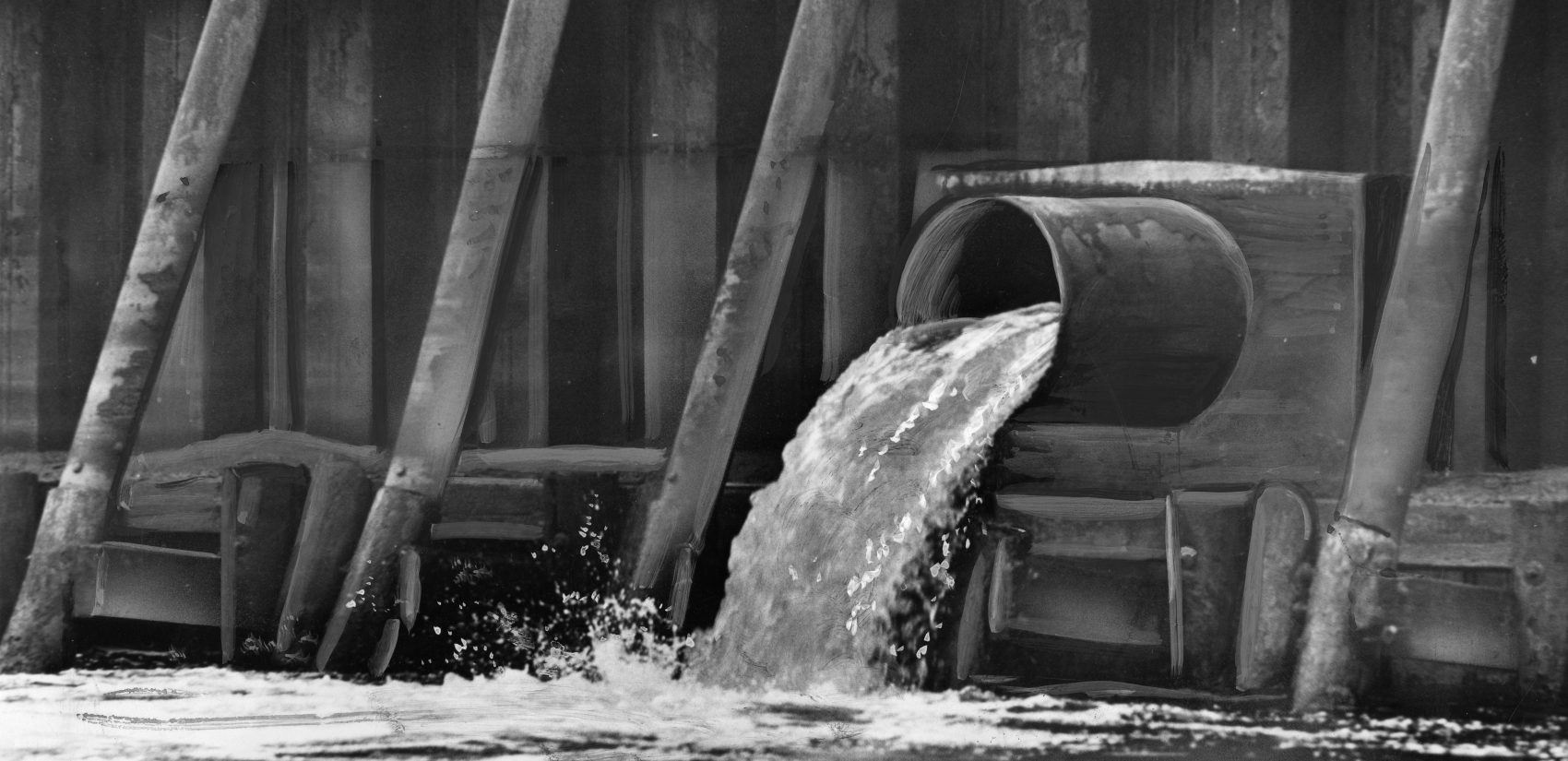 A photo from 1966 showing hot, smelly liquid pouring into the Delaware River from a nearby factory. (Temple Archives)