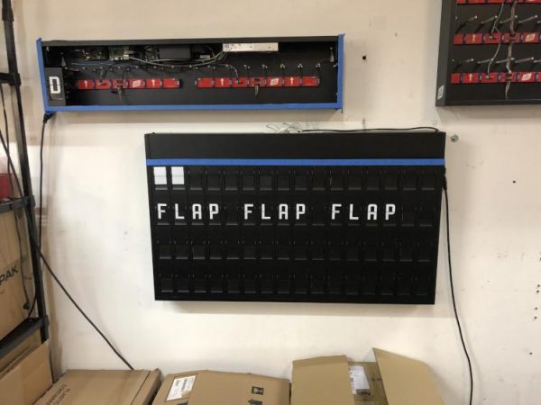 A split-panel display undergoes testing at Oat Foundry, a design engineering firm in Bensalem. (Meir Rinde for PlanPhilly)