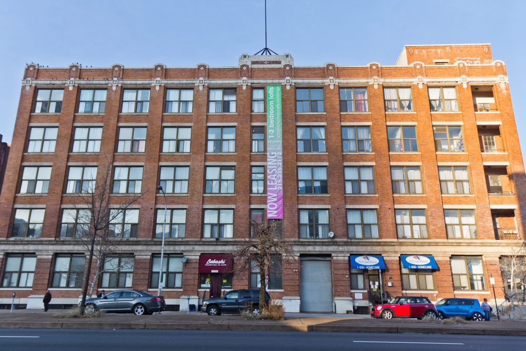 (Kimberly Paynter/WHYY) Arts & Crafts Holding advertises 1217 Spring Garden Street as
