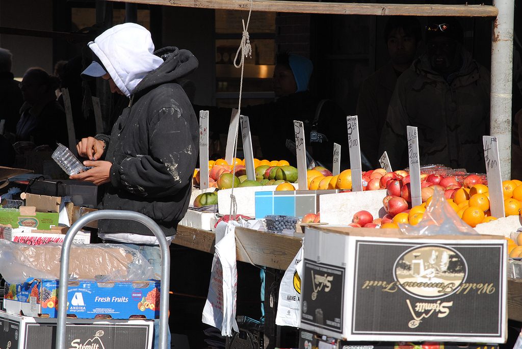 A fruit vendor in the Italian Market (David Swift Photography/ EOTS Flickr Group)