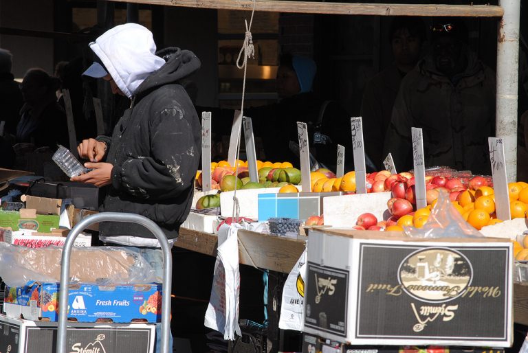 A fruit vendor in the Italian Market (David Swift Photography/ EOTS Flickr Group)