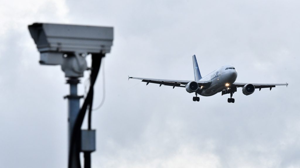 A jet lands at London Gatwick Airport on Friday. The airport had been closed for over a day after a drone repeatedly flew nearby. A jet lands at London Gatwick Airport on Friday. The airport had been closed for over a day after a drone repeatedly flew nearby. (Ben Stansall/AFP/Getty Images)
