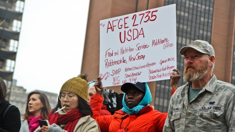 Federal government employees rally to call for an end to the shutdown on Independence Mall Tuesday. (Kimberly Paynter/WHYY)