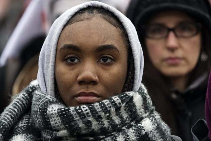 The audience listens to speakers on stage during the 2019 Women's March on the Benjamin Franklin Parkway, in Philadelphia, Pa. (Bastiaan Slabbers for WHYY)