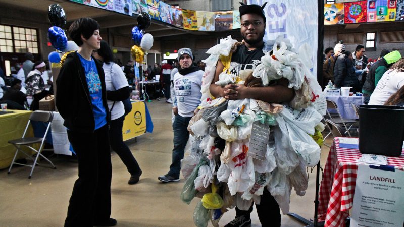 Timell Sherard dress as the plastic bad monster to convince people to cut back on plastic bag use. (Kimberly Paynter/WHYY)