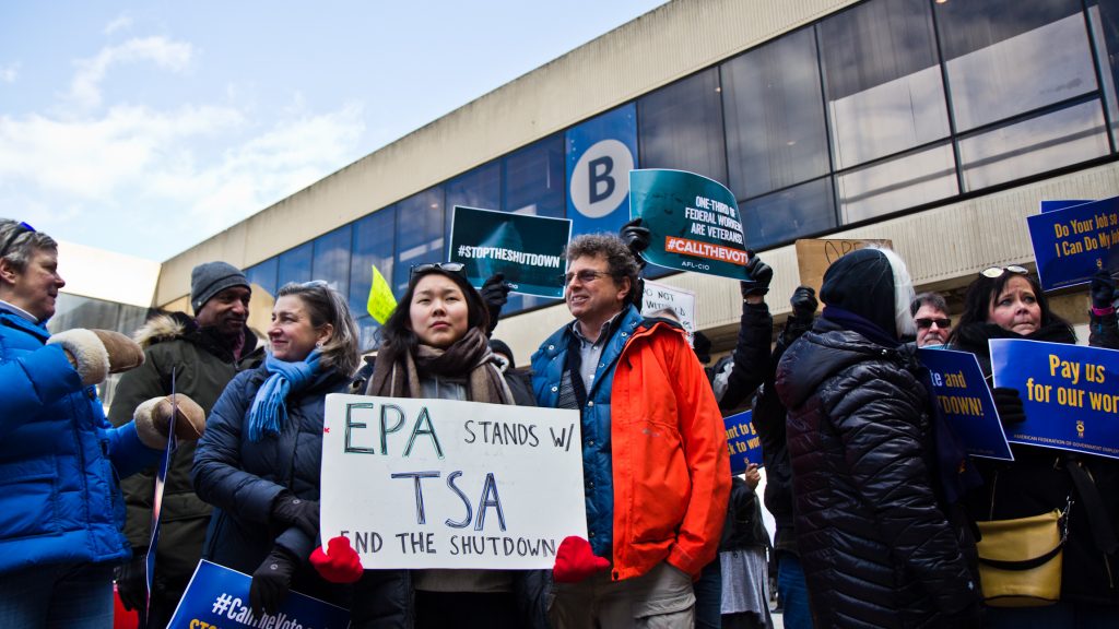 2019 01 25 kpaynter airport protest government shutdown Unions and supporters join the AFGE TSA at Philadelphia International airport to call for an end to the government shutdown. (Kimberly Paynter/WHYY)