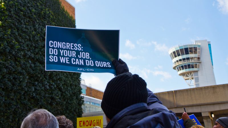 Unions and supporters join the AFGE TSA at Philadelphia International airport to call for an end to the government shutdown. (Kimberly Paynter/WHYY)