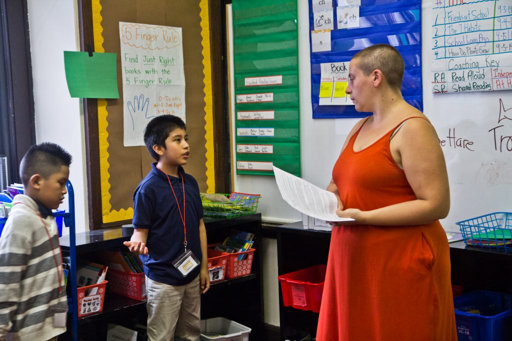 2019 10 10 k paynter concrete cowboys-3 A third-grade student explains to Isy Abraham-Raveson about why he chose the green light on behavior during a consent workshop. (Kimberly Paynter/WHYY)