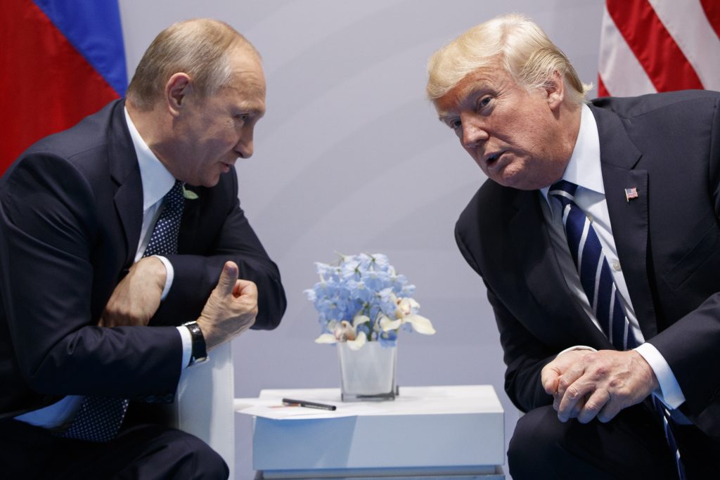 Donald Trump, Vladimir Putin U.S. President Donald Trump meets with Russian President Vladimir Putin at the G-20 Summit, Friday, July 7, 2017, in Hamburg. (AP Photo/Evan Vucci)
