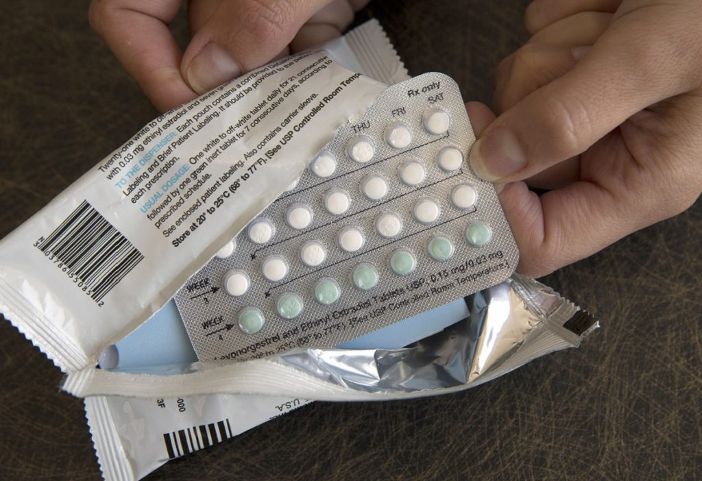In this Aug. 26, 2016, file photo, a one-month dosage of hormonal birth control pills is displayed in Sacramento, Calif. (AP Photo/Rich Pedroncelli)
