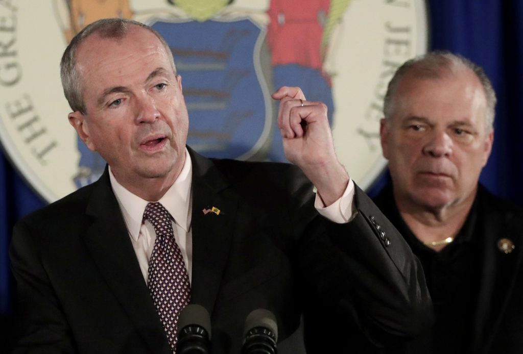 Marijuana Legalization In this June 30, 2018, file photo, New Jersey Gov. Phil Murphy, (left), discusses his state budget deal with Democratic legislative leaders, as state Senate President Stephen Sweeney, (right), listens during a news conference in Trenton, N.J. (Julio Cortez/AP Photo, File)