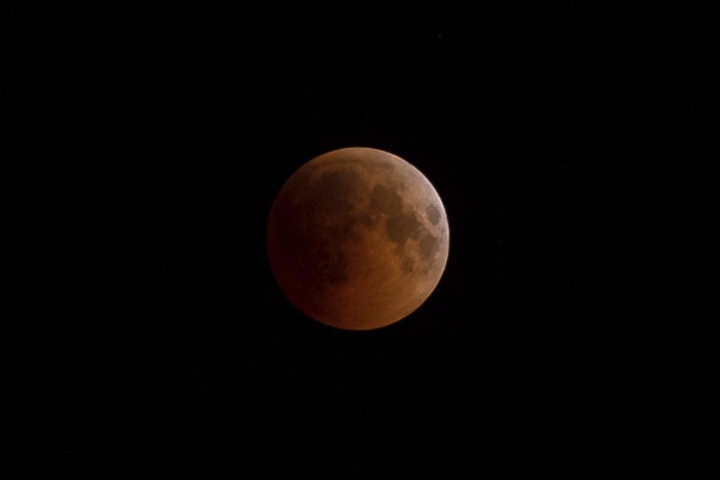 Total Lunar Eclipse. In this July 27 2018 file photo, Earth starts to cast its shadow on the moon during a total lunar eclipse seen from Volgograd, Russia. Starting Sunday evening, Jan. 20, 2019, all of North and South America will be able to see the only total lunar eclipse of 2019 from start to finish this weekend. (Aleksandr Kulikov/Kommersant/Sipa USA (Sipa via AP Images))