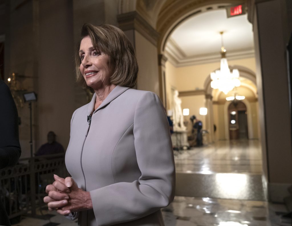 House Democratic Leader Nancy Pelosi of California, who will become speaker of the House on Jan. 3, walks to her new office at the Capitol during a television interview for the NBC Today Show, in Washington, Wednesday, Jan. 2, 2019. The Republicans will relinquish the majority to House Democrats under the leadership of Nancy Pelosi beginning a new era of divided government. (J. Scott Applewhite/AP Photo)