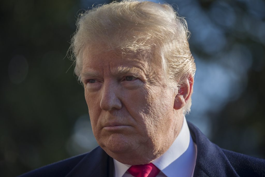 Donald Trump In this file photo, President Donald Trump pauses while speaking on the South Lawn of the White House as he walks to Marine One, Sunday, Jan. 6, 2019, in Washington. (Alex Brandon/AP Photo)