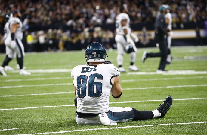 Philadelphia Eagles tight end Zach Ertz (86) sits on the turf after the New Orleans Saints intercepted a pass in the second half of an NFL divisional playoff football game in New Orleans, Sunday, Jan. 13, 2019. The Saints won 20-14. (AP Photo/Butch Dill)