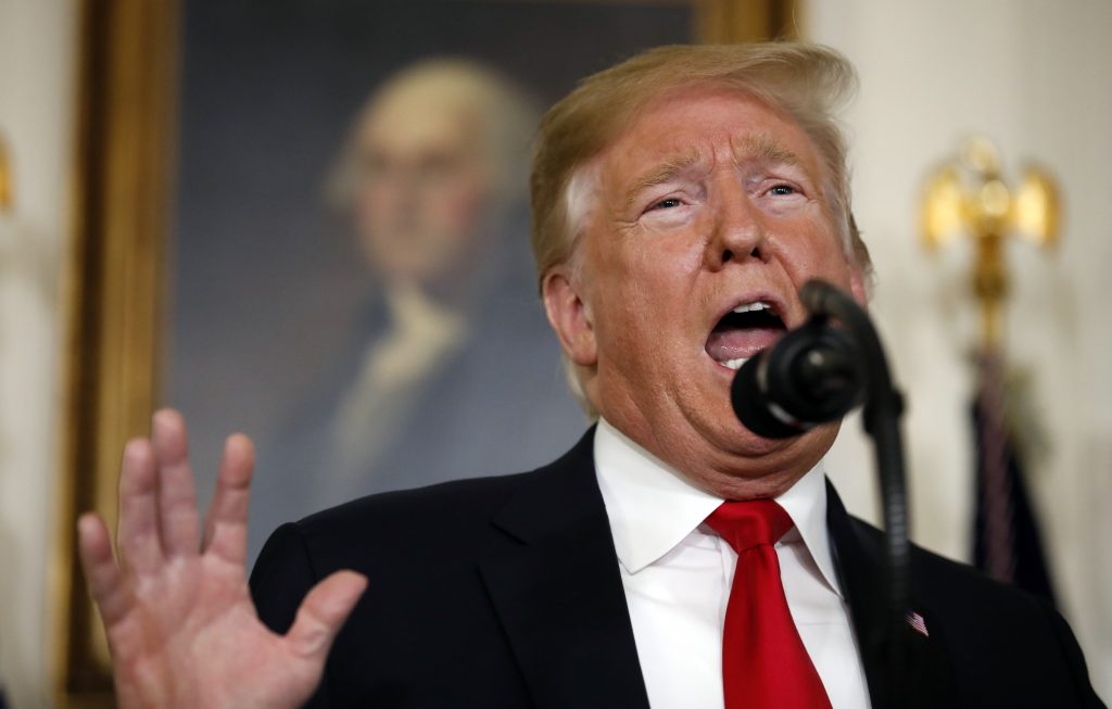 Donald Trump President Trump speaks about the partial government shutdown, immigration and border security in the Diplomatic Reception Room of the White House Saturday.
(Alex Brandon/AP)