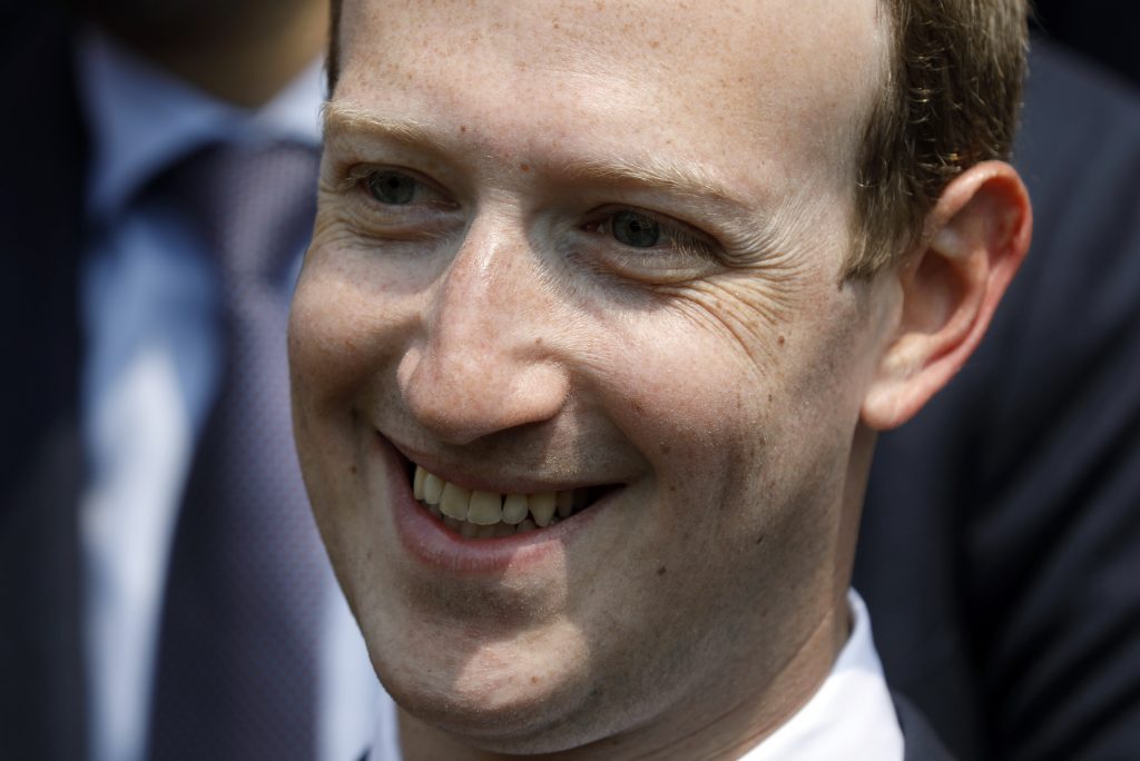 In this May 23, 2018 file photo, Facebook's CEO Mark Zuckerberg smiles during a picture with guests attending the 
