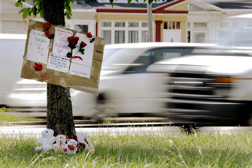 Family Struck on Highway A makeshift memorial is shown near the location where a mother and three young sons were struck and killed while trying to cross a busy highway after dark, Wednesday, July 17, 2013 in Philadelphia. A fourth son was injured in the crash Tuesday night on Roosevelt Boulevard, a major artery that divides neighborhoods in north and northeast Philadelphia. (Matt Rourke/AP Photo)
