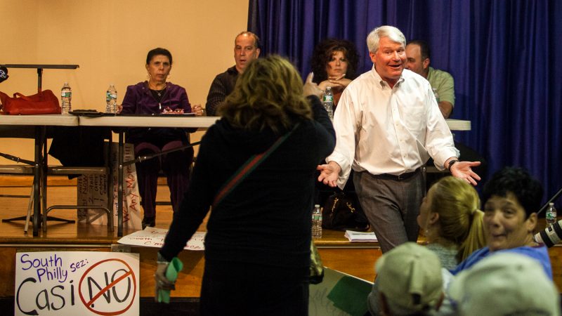 Labor leader John Dougherty reacts to jeers from audience members during a meeting on a proposed casino near the sports complex in South Philadelphia on Nov. 12, 2014. (Brad Larrison/for NewsWorks)