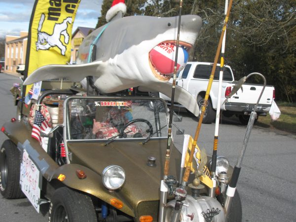 Art Wilson of Clayton is in his first parade. He was proud to show off his dune buggy. The shark was autographed by Bruce Meyers, the creator of the dune buggy. (John Mussoni/WHYY)
