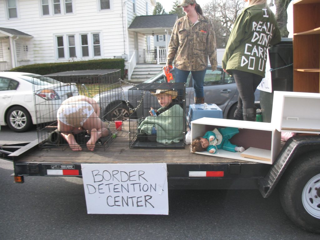 Hummer’s parade float A controversial entry in this year's Hummers Parade in Middletown, Del. depicts migrant children in cages at the U.S.-Mexico border. (John Mussoni/WHYY)