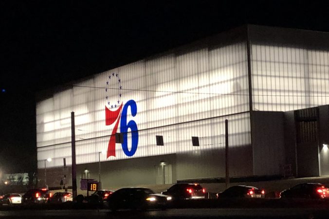 A steady steam of vehicles streamed into Wilmington's new arena for the Delaware Blue Coats on Wednesday. (Cris Barrish, WHYY News)