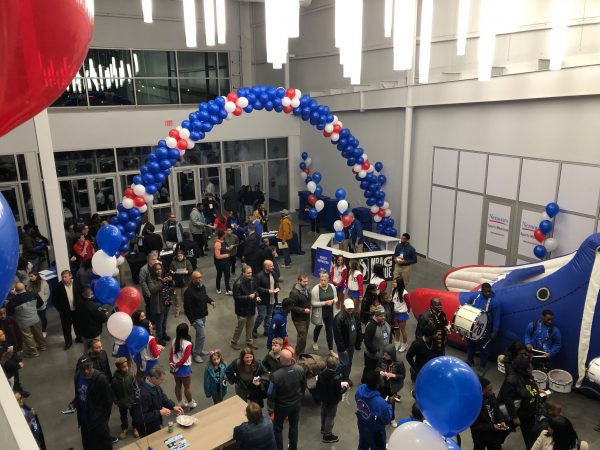 Fans entering the arena were greeted by a spectacle that included cheerleaders and drummers and men dressed in the 
Blue Coats' Revolutionary War garb. (Cris Barrish, WHYY News)