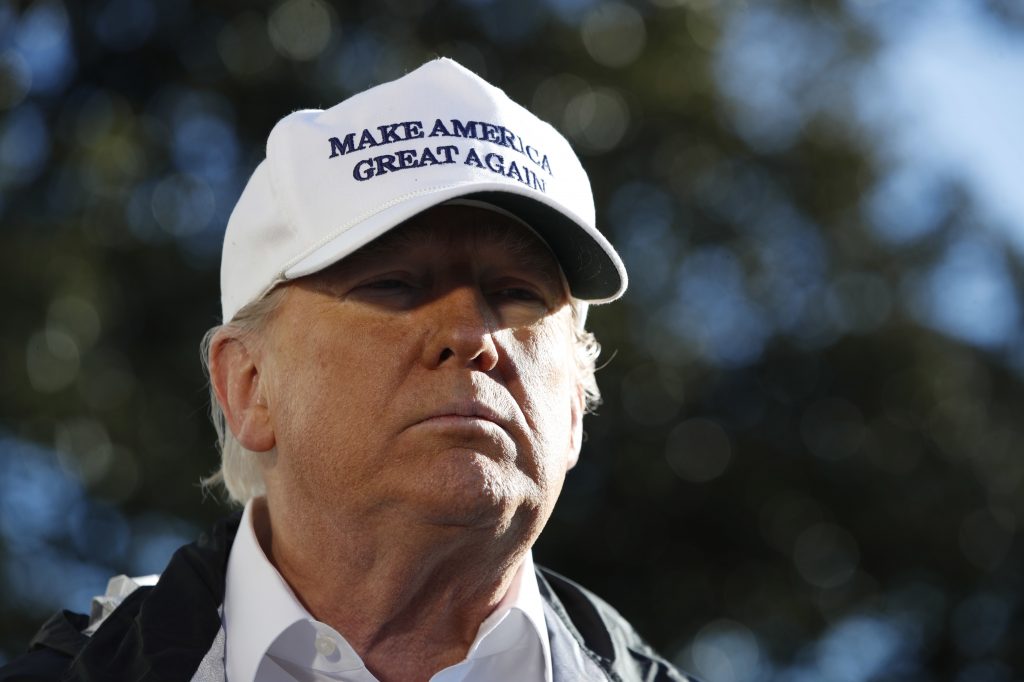 President Trump addresses the media as he leaves the White House on Thursday en route for a trip to the border in Texas. (Jacquelyn Martin/AP)