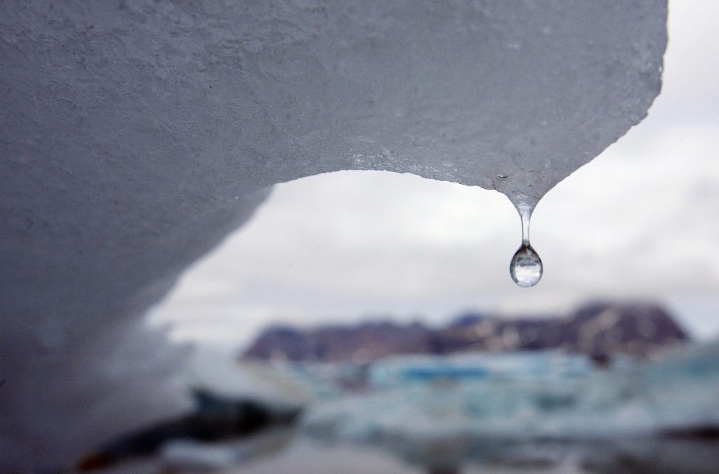 Photos Of The Decade Greenland Climate Change An iceberg melts in Kulusuk Bay, eastern Greenland, in this July 17, 2007, file photo. The melting of the Greenland ice cap and its effect on the area around Greenland is one of the more immediate effects of climate change. (AP Photo/John McConnico, File)