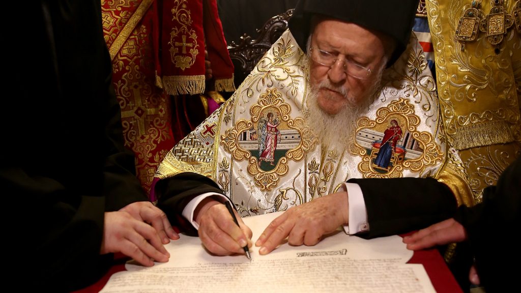 Bartholomew I signs the Tomos of Autocephaly, marking the formal independence of the Ukrainian Orthodox Church at the Patriarchal Church of St. George, in Istanbul. Bartholomew I signs the Tomos of Autocephaly, marking the formal independence of the Ukrainian Orthodox Church at the Patriarchal Church of St. George, in Istanbul.
(Anadolu Agency/Getty Images)
