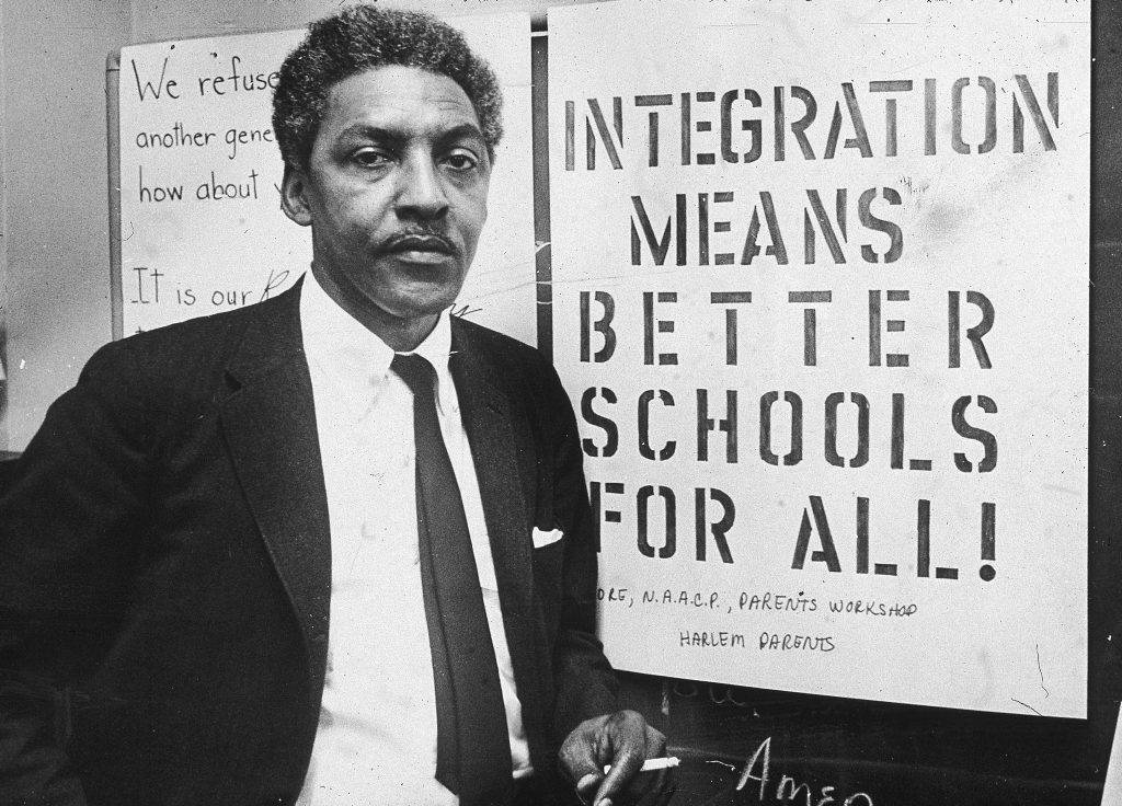 American civil rights activist Bayard Rustin, pictured in 1964, as spokesman for the Citywide Committee for Integration, at the organization’s headquarters, Silcam Presbyterian Church in New York City. American civil rights activist Bayard Rustin, pictured in 1964, as spokesman for the Citywide Committee for Integration, at the organization's headquarters, Silcam Presbyterian Church in New York City. (Patrick A. Burns/New York Times Co./Getty Images)