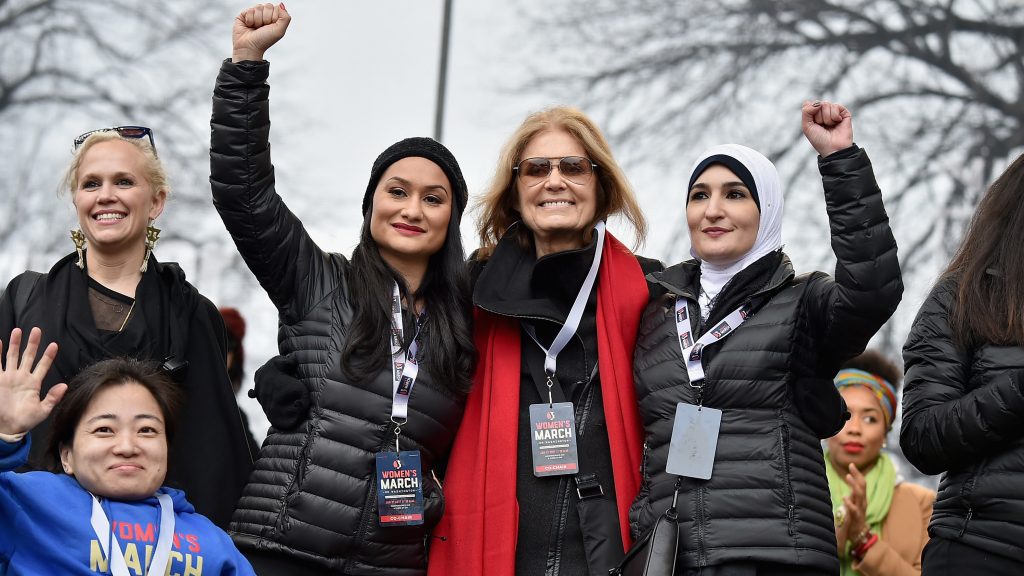 Ginny Suss, Carmen Perez, Gloria Steinem, Linda Sarsour and Mia Ives-Rublee appear at the first Women’s March in Washington, D.C., the day after President Trump’s 2017 inauguration. Two years later, divisions in the movement have dampened the 2019 events. Ginny Suss, Carmen Perez, Gloria Steinem, Linda Sarsour and Mia Ives-Rublee appear at the first Women's March in Washington, D.C., the day after President Trump's 2017 inauguration. Two years later, divisions in the movement have dampened the 2019 events. (Theo Wargo/Getty Images)