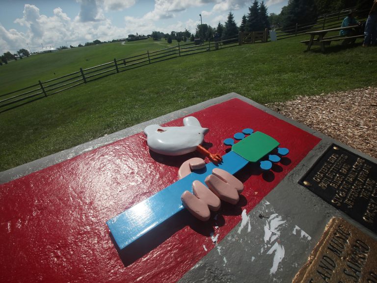 A plaque marks the site of the original Woodstock festival in Bethel, N.Y.