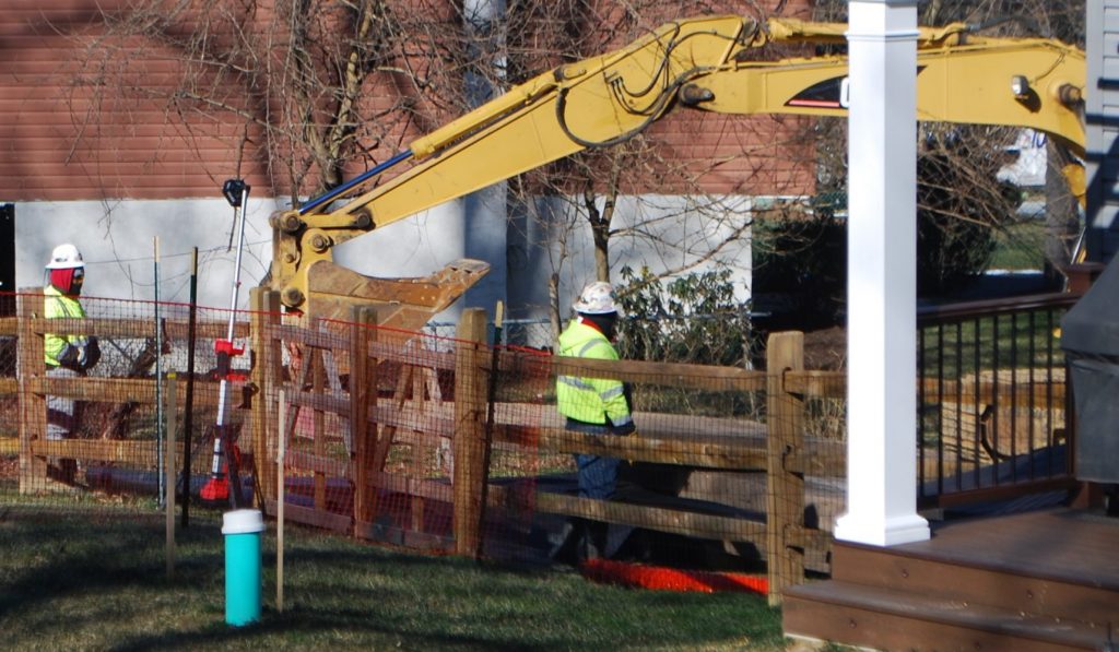 lisa_drive_backyard-e1548096620846-1920×1000 Crews worked on Monday Jan. 21 to stabilize a new sinkhole that opened up at Lisa Drive, a suburban development in West Whiteland Township, Chester County where Sunoco operates its Mariner East pipelines. (Jon Hurdle / StateImpact Pennsylvania)