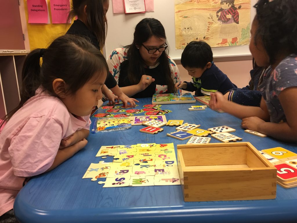 Teacher Shanelle Yazzie works with children at a Head Start facility on the Navajo Nation. Funds to keep the Head Start programs running are slow to reach these facilities during the federal government shutdown. Teacher Shanelle Yazzie works with children at a Head Start facility on the Navajo Nation. Funds to keep the Head Start programs running are slow to reach these facilities during the federal government shutdown.
(Laurel Morales/KJZZ)