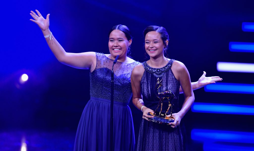 Teenage sisters Melati and Isabel Wijsen of Bali have received many honors for their efforts to ban plastic bags. Above: They accept the 2017 “Award for Our Earth” from Germany’s Bambi Awards. Teenage sisters Melati and Isabel Wijsen of Bali have received many honors for their efforts to ban plastic bags. Above: They accept the 2017