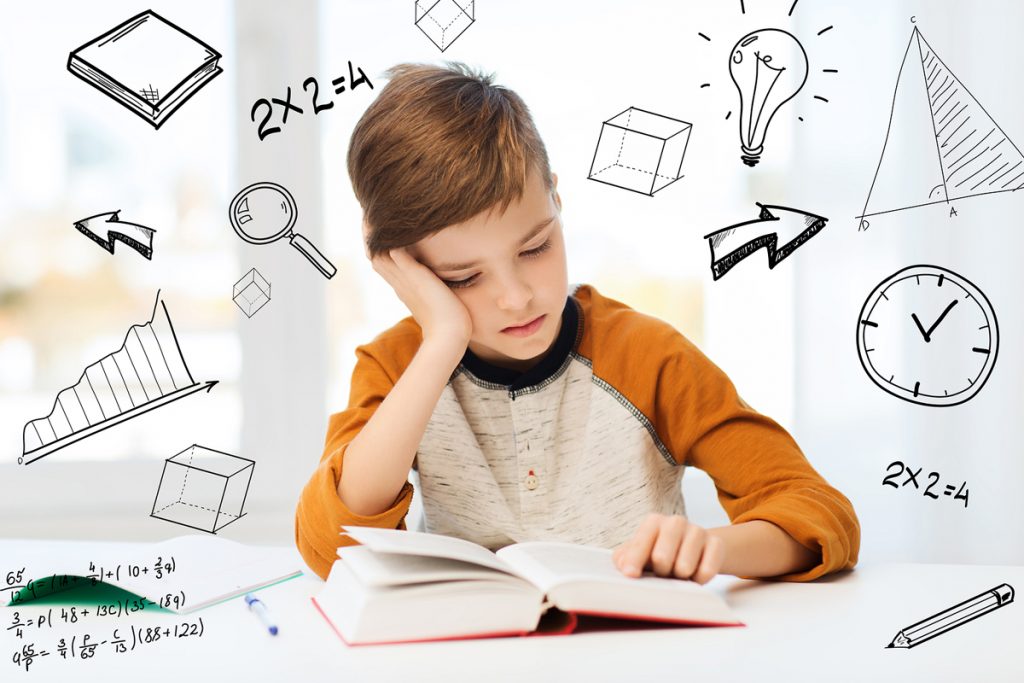 education, childhood, people, homework and school concept – bore A student is struggling with his math homework. (dolgachov/BIGSTOCK)