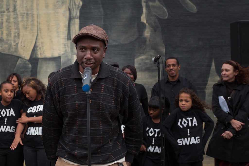 2014-062_Ascending_Beyond_DEDICATION_37-3 Artist Willis Humphrey. better known as NOMO, speaks at the dedication of his mural,