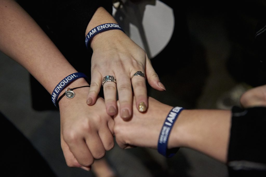 2018 11 27-n piserchio-temple university students-philadelphia temple university student center the reel-scott fried sexual assault program bracelets DSC_1154 Students who attended Scott Fried's program wear bracelets given to them by Fried that read,