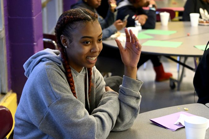 Members of the girls basketball team from MLK and Lankenau High Schools which is coached by Lurline Jones, gather for an end-of-year banquet hosted by coach Lurline Jones, at the cafeteria of MLK Highschool in Northwest Philadelphia, Pa., on February 19, 2019. (Bastiaan Slabbers for WHYY)