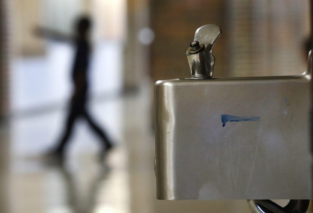 Detroit Schools Water A student walks in the hallway past a water fountain at Noble School in Detroit, Tuesday, Sept. 4, 2018. (Paul Sancya/AP Photo)