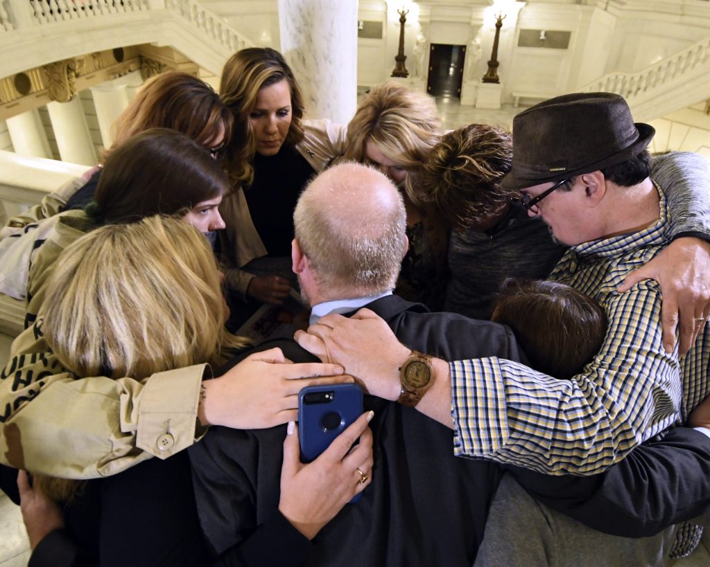 Clergy Abuse-Pennsylvania Legislature Survivors of child sexual abuse hug in the Pennsylvania Capitol while awaiting legislation to respond to a landmark state grand jury report on child sexual abuse in the Roman Catholic Church, Wednesday, Oct. 17, 2018 in Harrisburg, Pa. (Marc Levy/AP Photo)