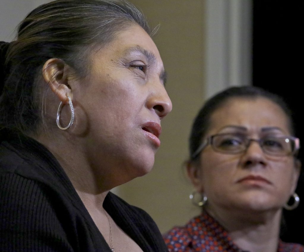 Trump Resort-Illegal Workers Sandra Diaz, (right), listens as Victorina Morales, (left), recalls her experience working at President Donald Trump's golf resort in Bedminster, N.J., during an interview, Friday Dec. 7, 2018, in New York. (Bebeto Matthews/AP Photo)